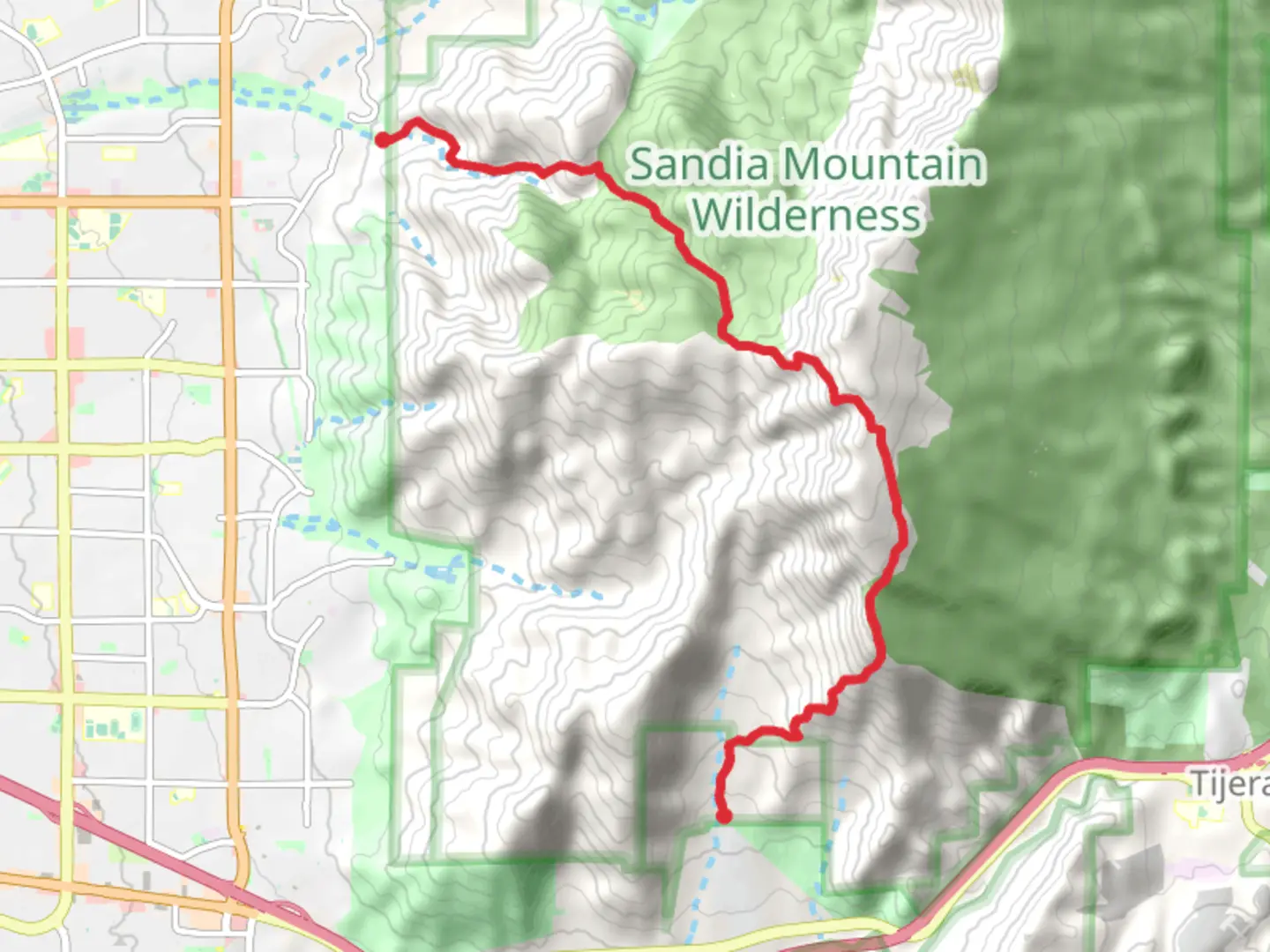 An image depicting the trail South Crest Trail and Embudito Trail and its surrounding area.