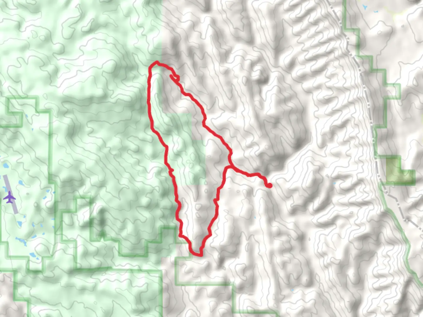 An image depicting the trail Zim-Zim Falls and Nevada Creek Loop Trail and its surrounding area.