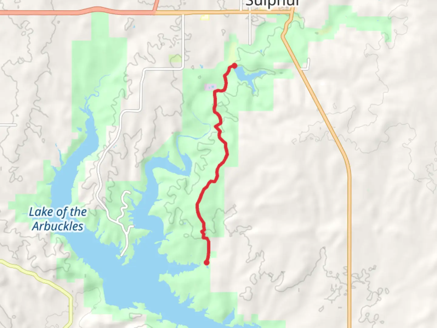 An image depicting the trail Rock Creek Trail 1 - Lake of the Arbuckles and its surrounding area.