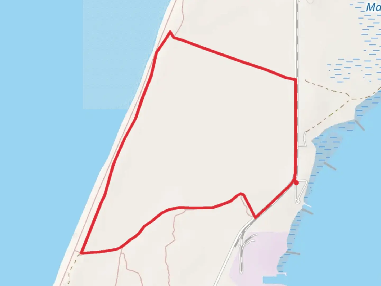 An image depicting the trail The North Spit Loop and its surrounding area.