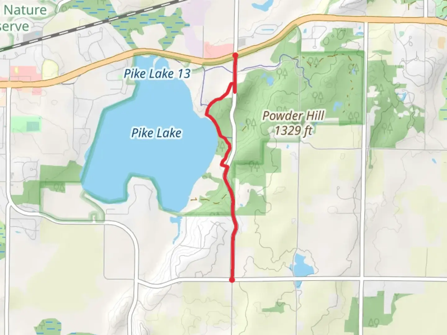 An image depicting the trail Kettle Moraine Road and its surrounding area.
