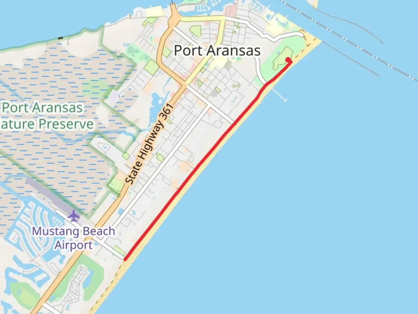 An image depicting the trail Port Aransas Beach Road Trail and its surrounding area.