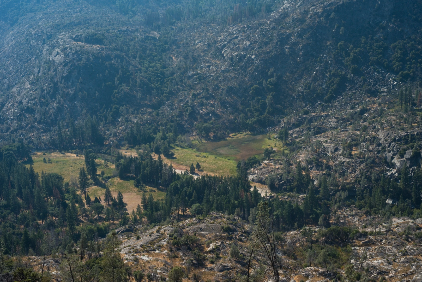 An image depicting the trail Poopenaut Valley Trail and its surrounding area.