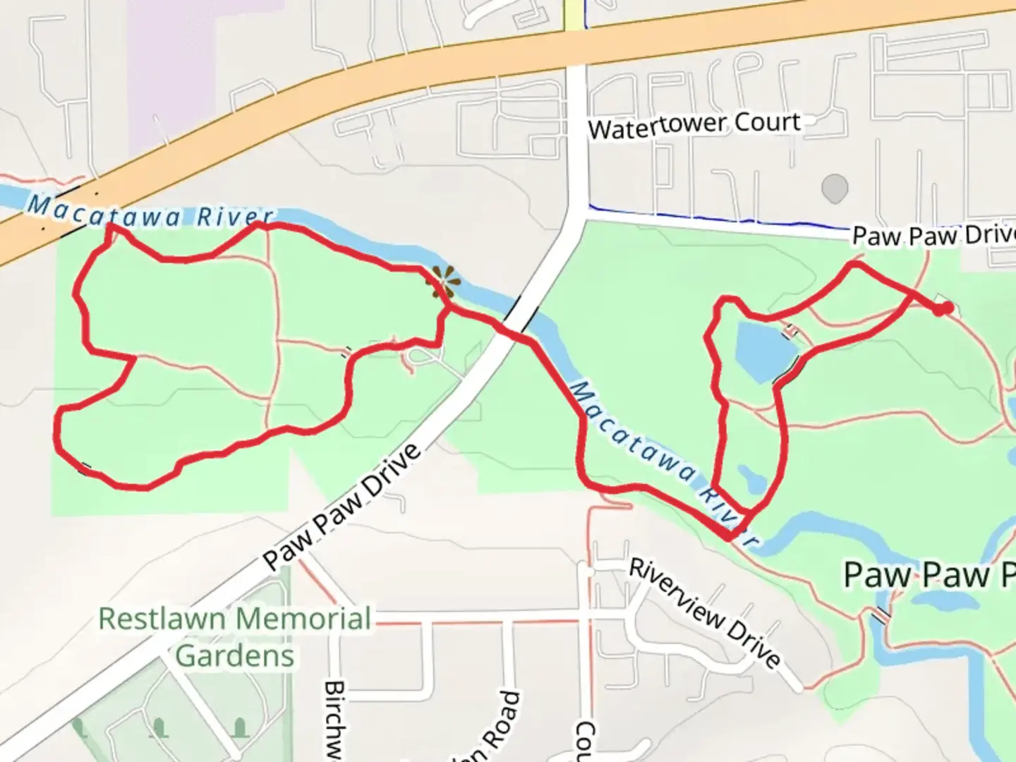 An image depicting the trail Macatawa River Loop from Paw-Paw Park and its surrounding area.
