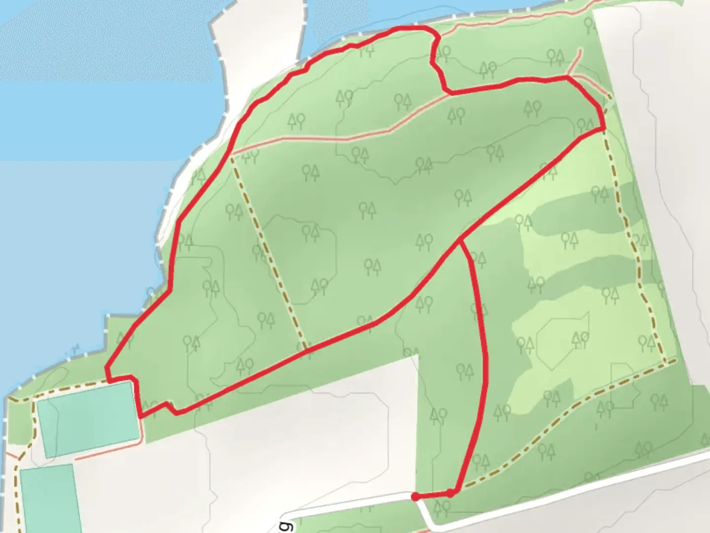 An image depicting the trail Rostellan Loop - Whitewell Cross and its surrounding area.