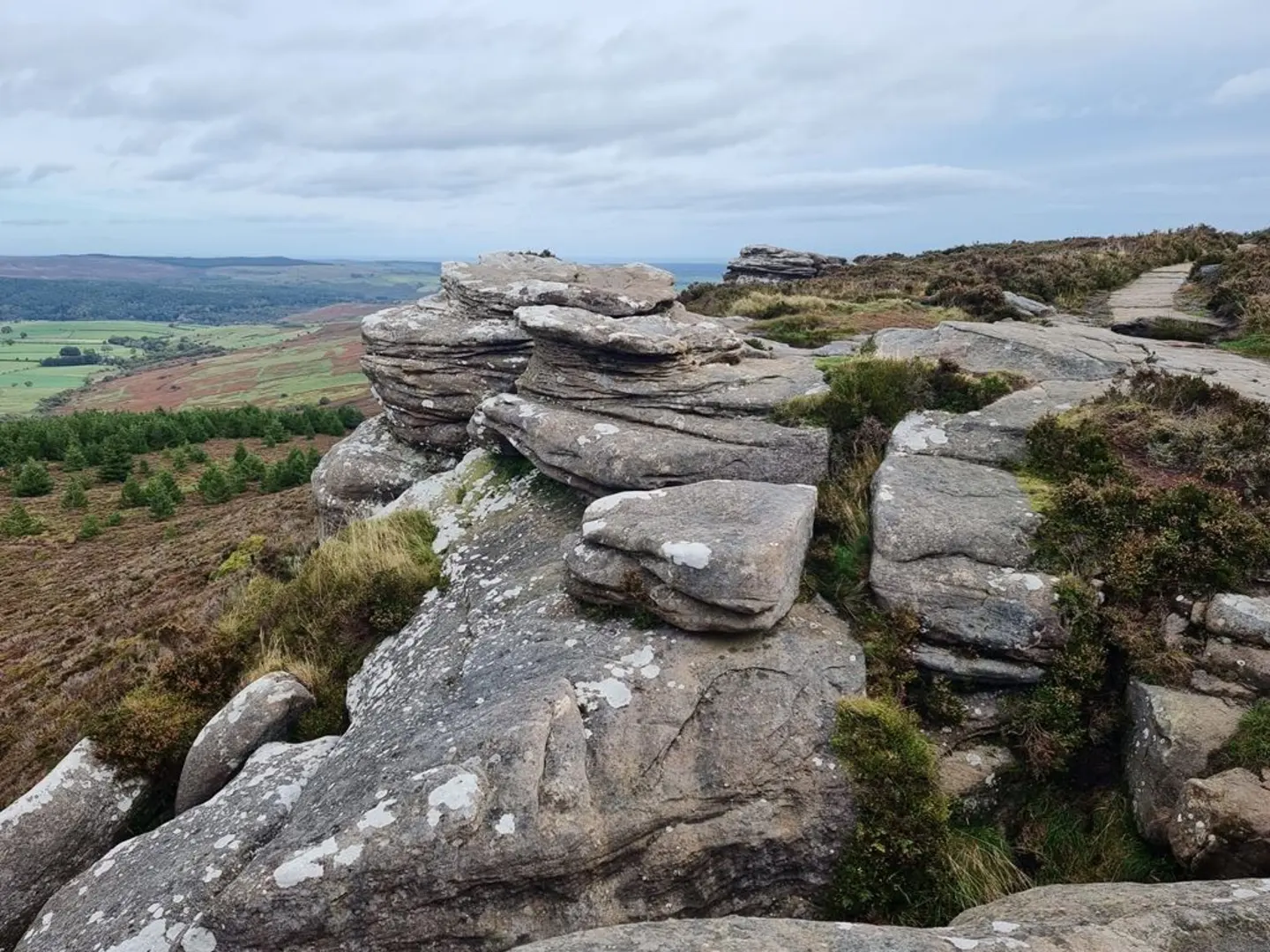 An image depicting the trail Dove Crag and Simonside Loop and its surrounding area.