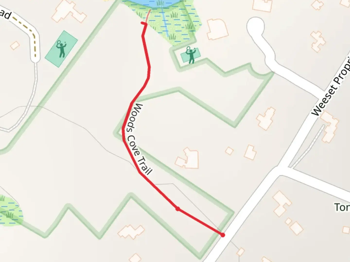 An image depicting the trail Woods Cove Trail and its surrounding area.