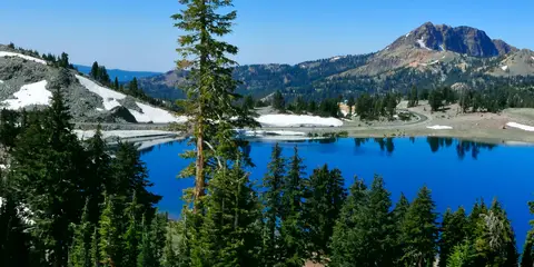 An image depicting the trail Lassen Volcanic National Park Lakes Loop and its surrounding area.