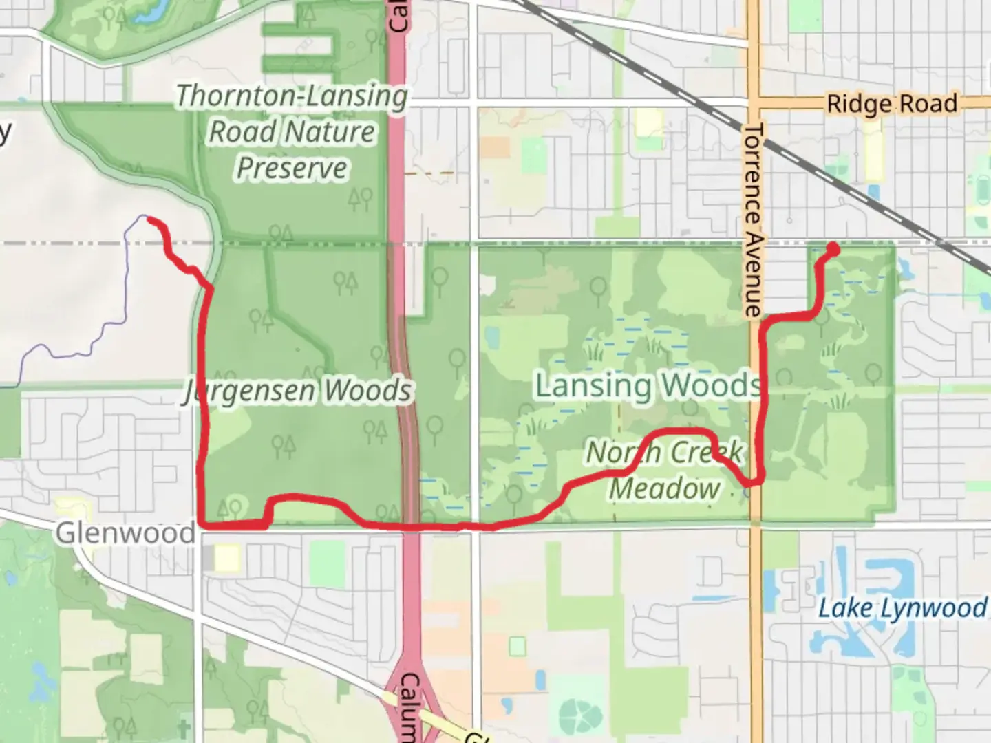 An image depicting the trail Thorn Creek Red Paved Trail and its surrounding area.
