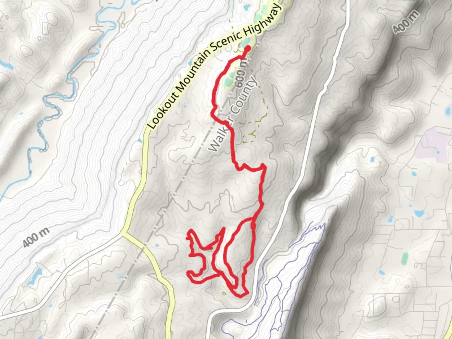An image depicting the trail Geber Branch Loop from South Campus Road and its surrounding area.