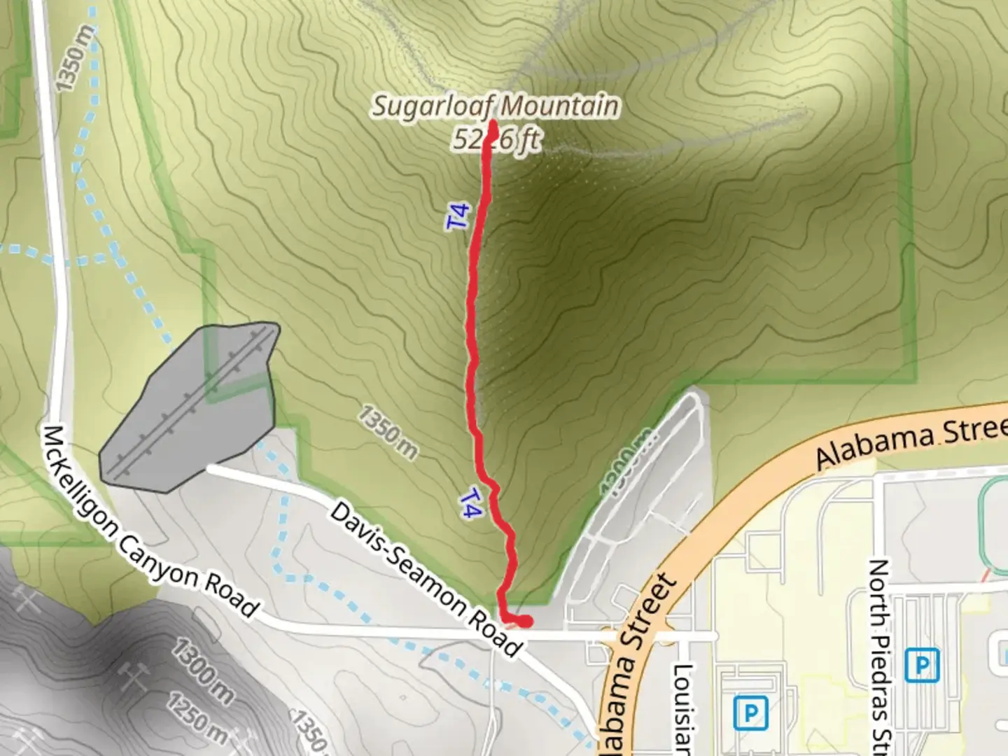 An image depicting the trail Sugarloaf Mountain from McKelligon Canyon Road and its surrounding area.
