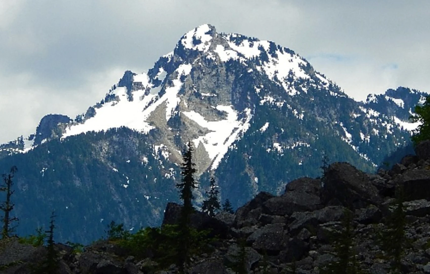 An image depicting the trail Park Pass via Larch Creek, Billy Goat Pass Trail and its surrounding area.
