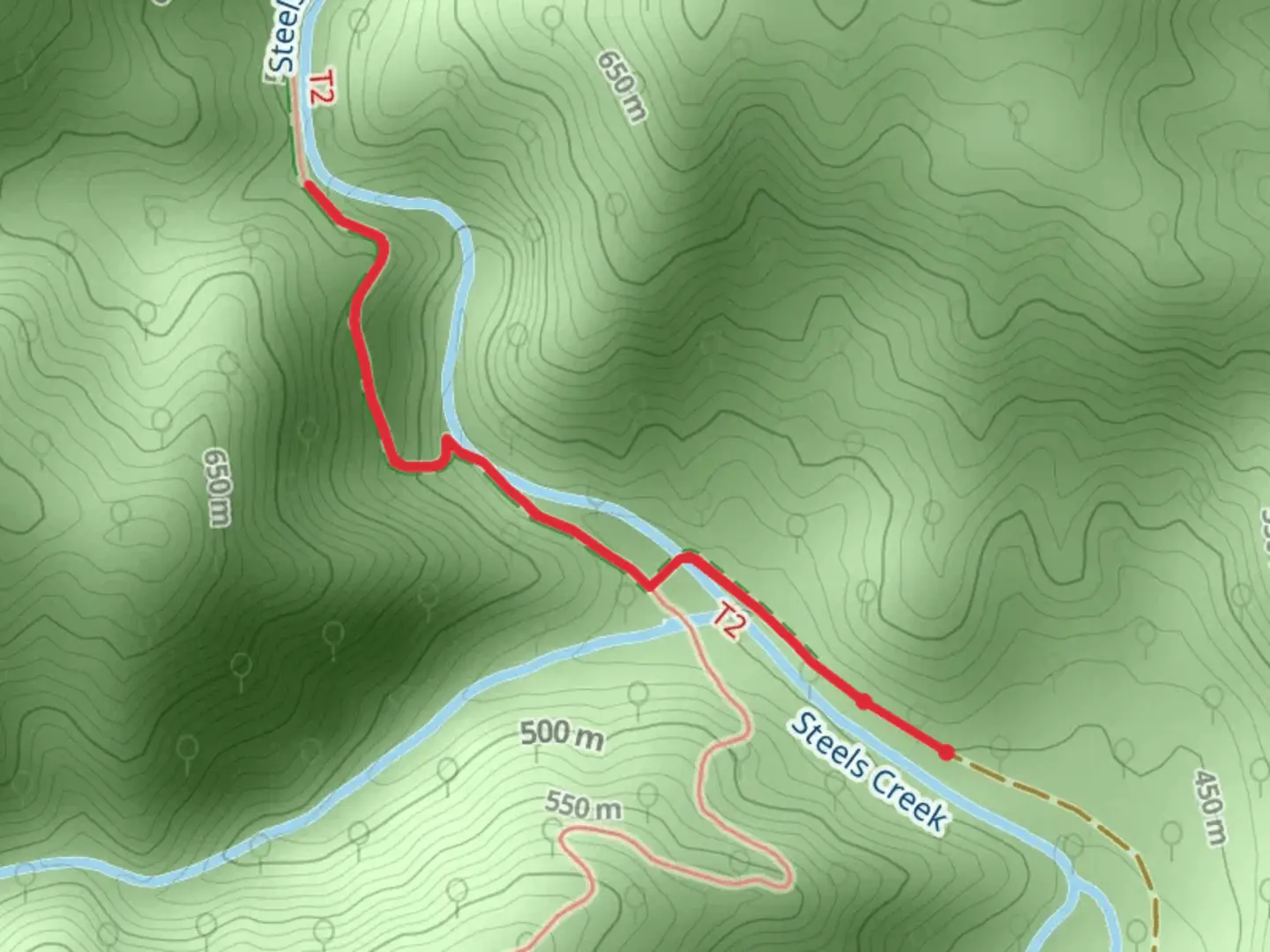 An image depicting the trail Steels Creek Falls and its surrounding area.