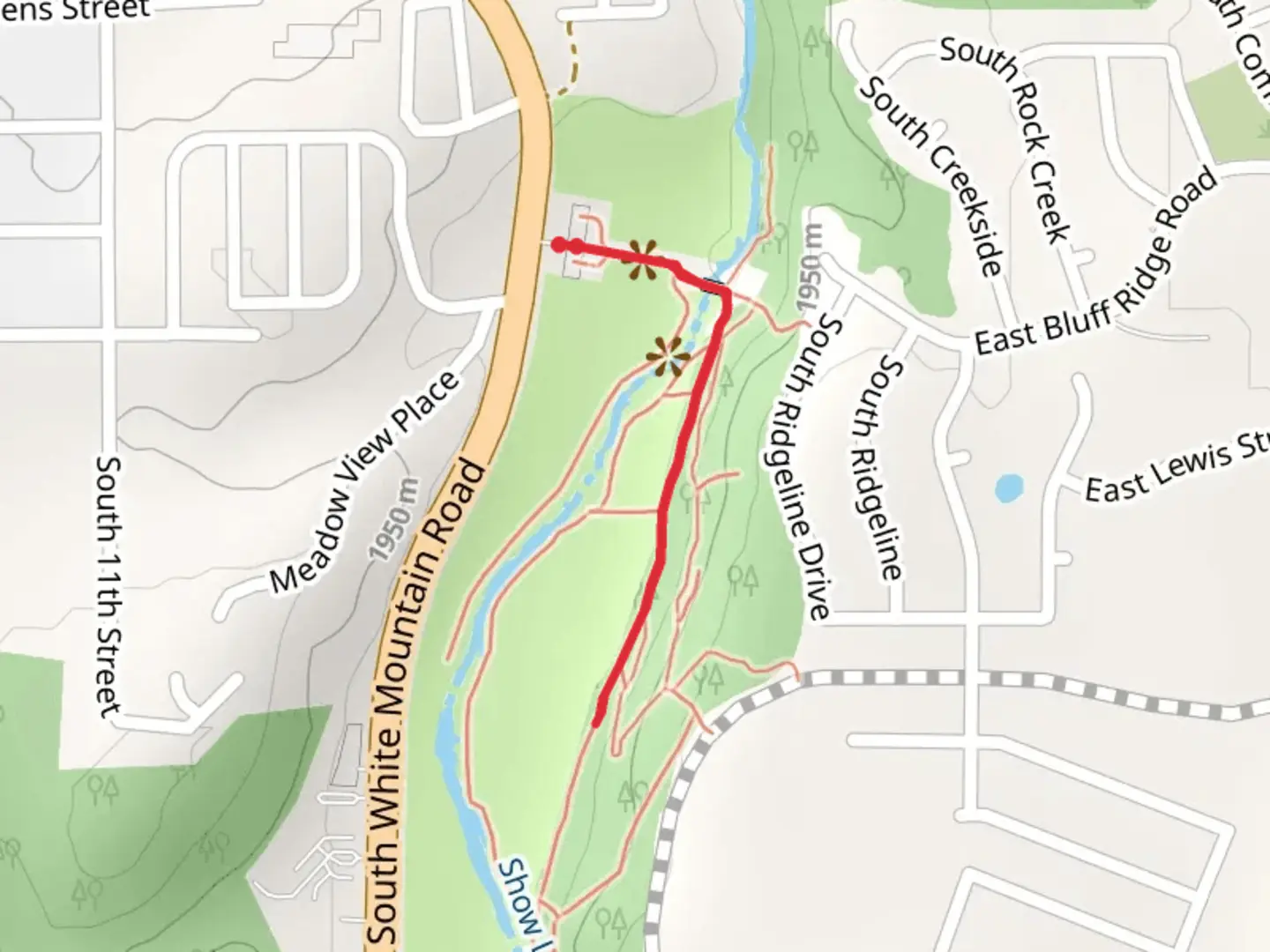 An image depicting the trail Show Low Bluff Trail and its surrounding area.