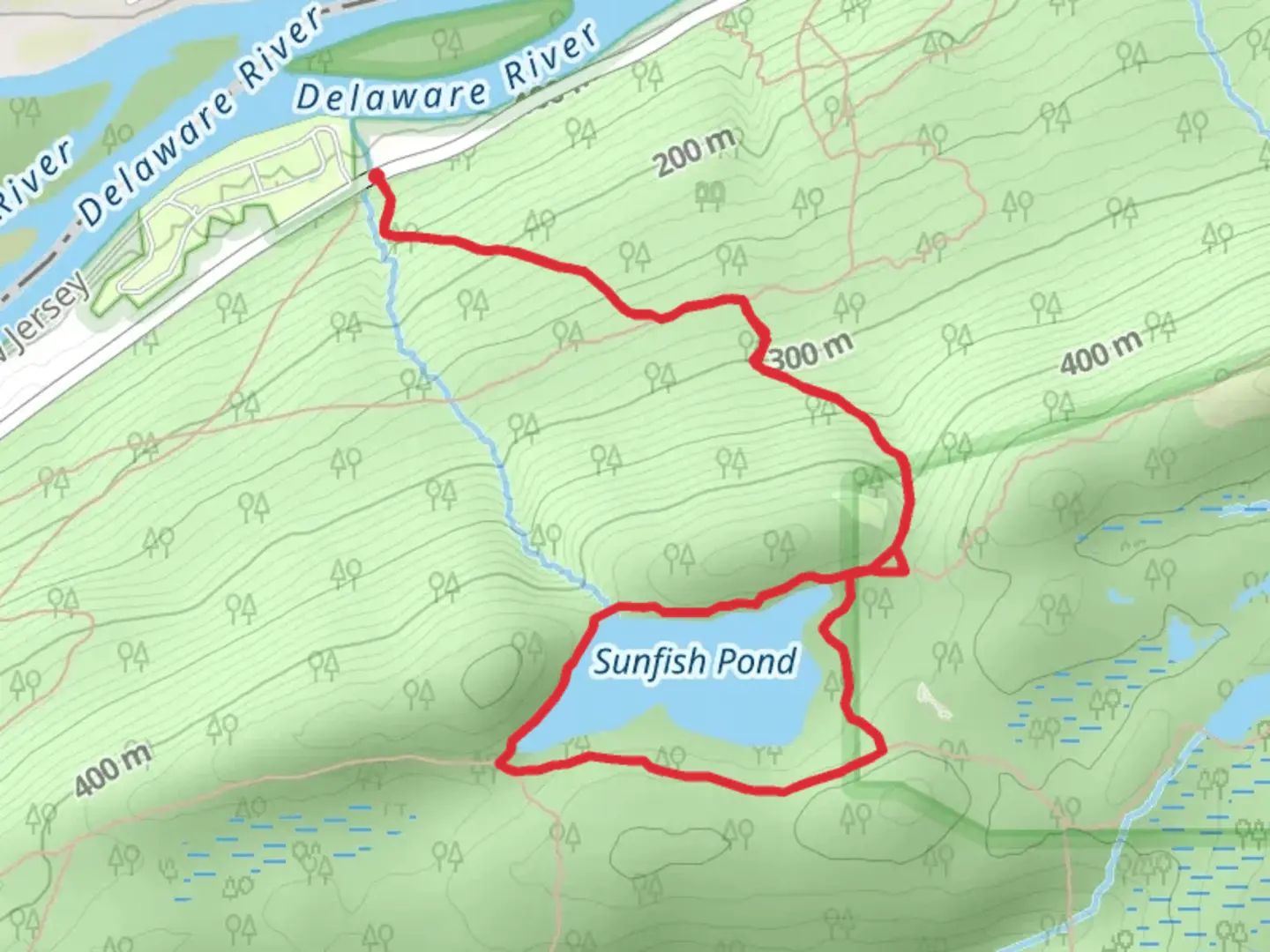 An image depicting the trail Sunfish Pond via Garvey Springs Loop Trail and its surrounding area.