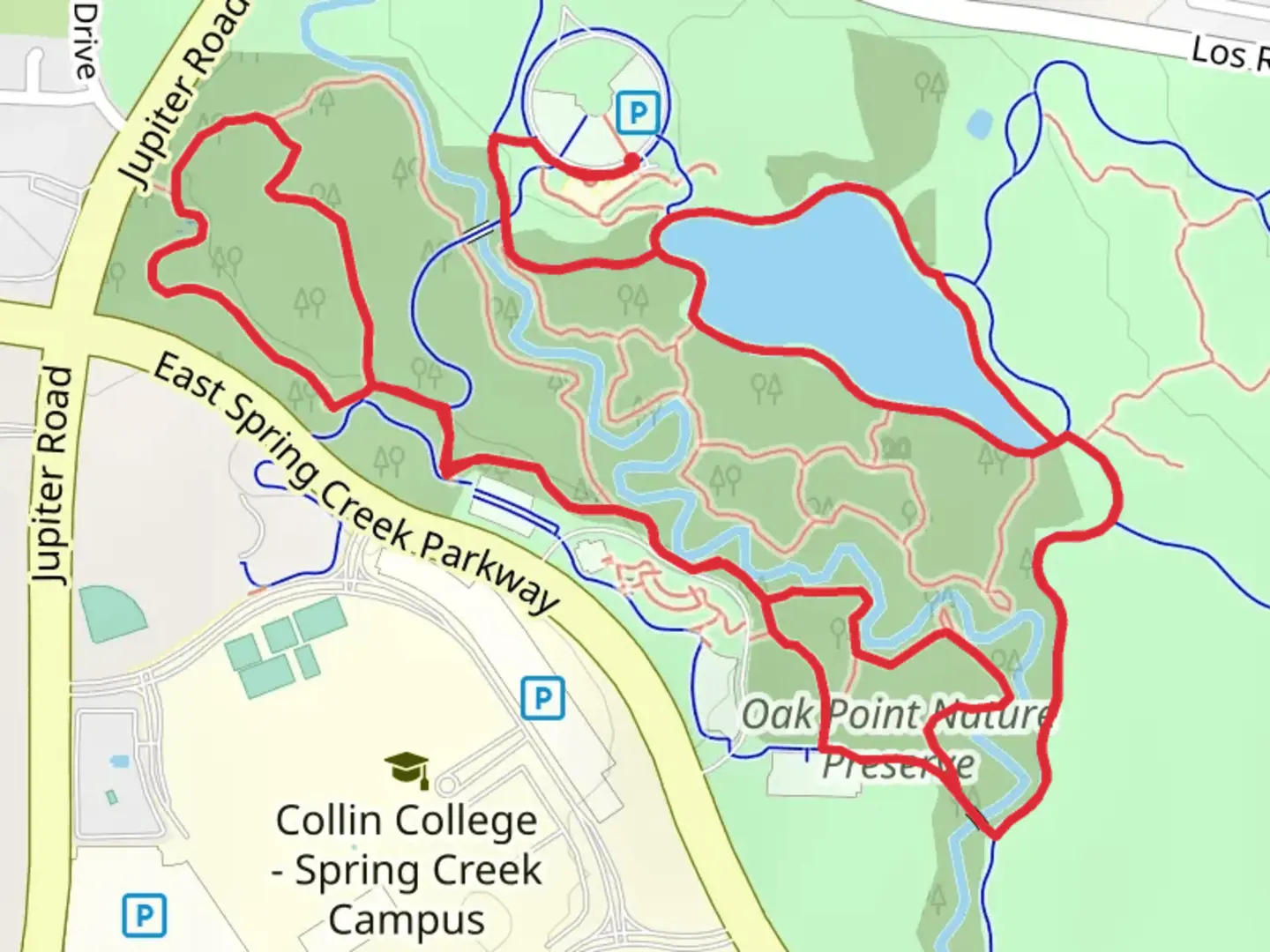 An image depicting the trail Oak Point Park and Nature Preserve - Rowlett Creek and Willow Springs Trail and its surrounding area.