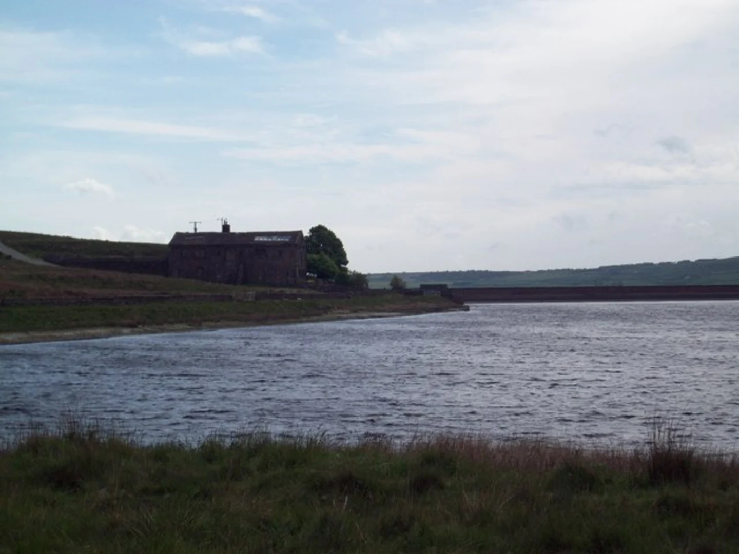 An image depicting the trail Hebden Bridge to Withens Clough Reservoir Loop via Stoodley Pike and its surrounding area.