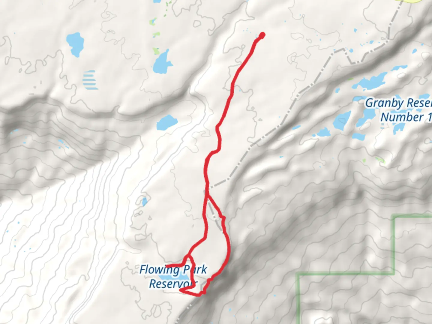 An image depicting the trail Flowing Park Reservoir Loop and its surrounding area.