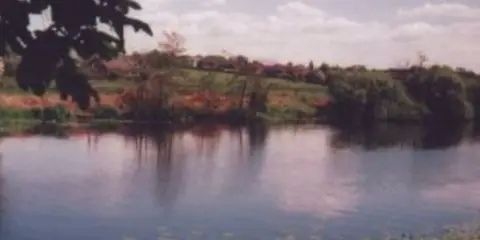 An image depicting the trail Newry Canal Way and its surrounding area.