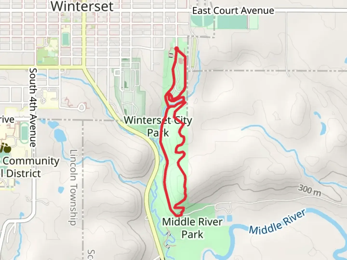 An image depicting the trail Winterset City Park Loop and its surrounding area.