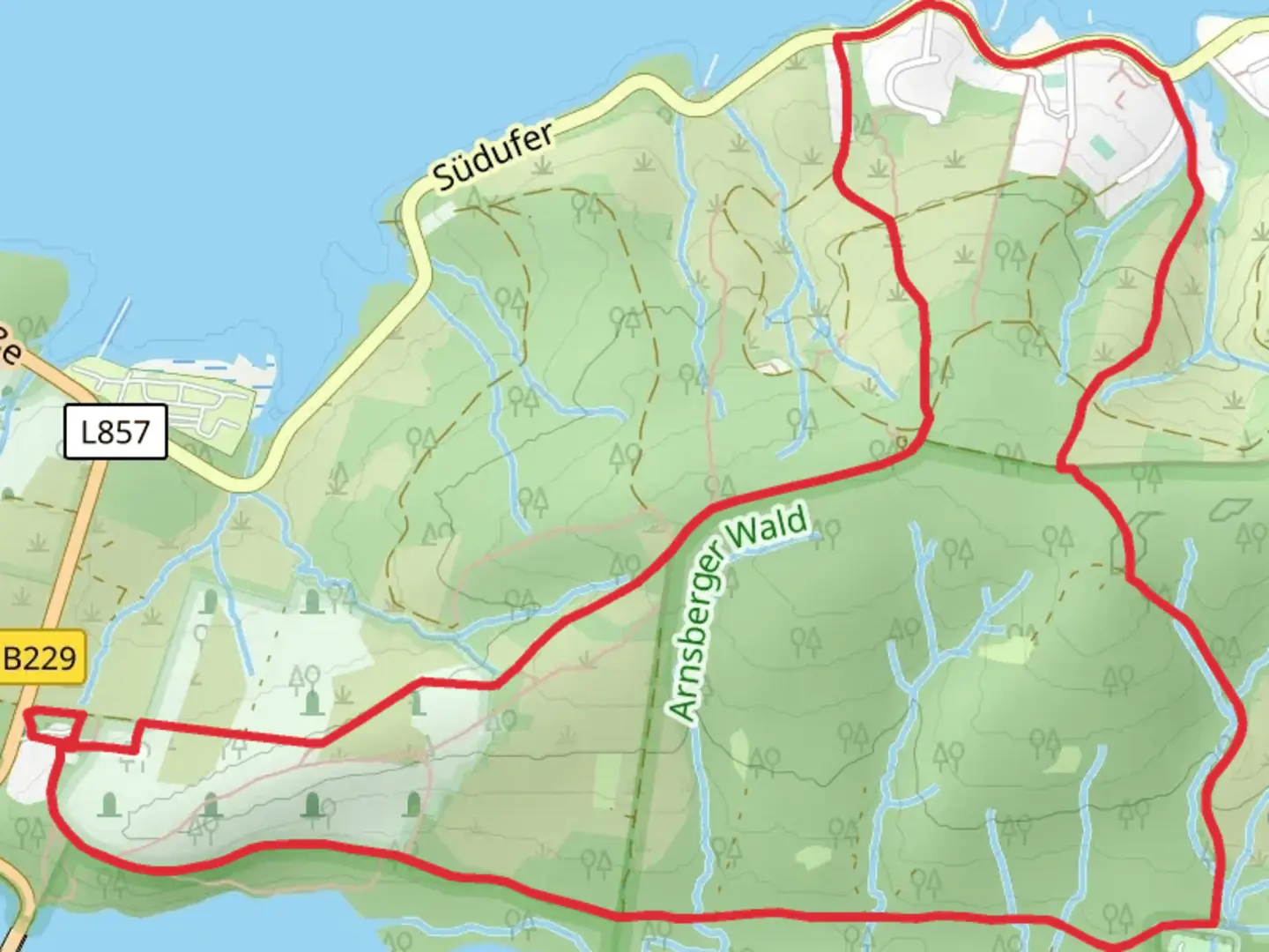 An image depicting the trail Torhaus and Trimmpfad Rundweg and its surrounding area.