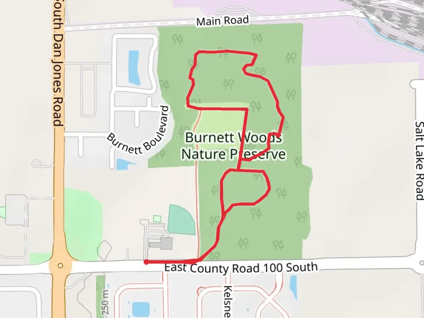 An image depicting the trail Burnett Woods Nature Preserve Loop and its surrounding area.