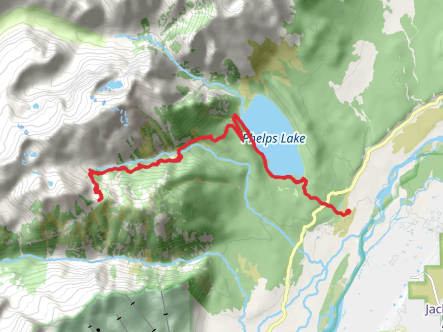 An image depicting the trail Mount Hunt Divide and Phelps Lake from LSR Preserve Road and its surrounding area.