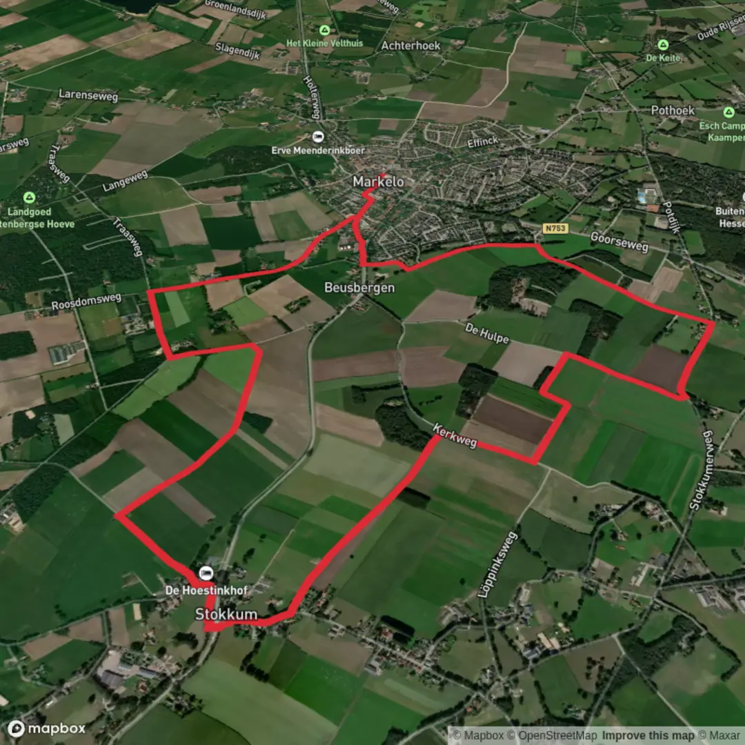 An image depicting the trail De Hemmel via Stokkum Gele Route and Voordesdijk Loop and its surrounding area.