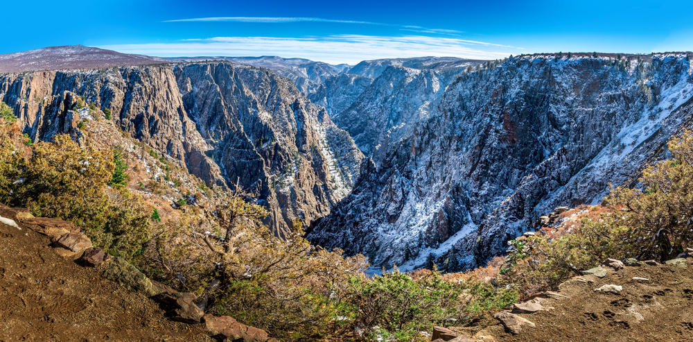 An image depicting the trail Black Canyon of the Gunnison National Park and its surrounding area.