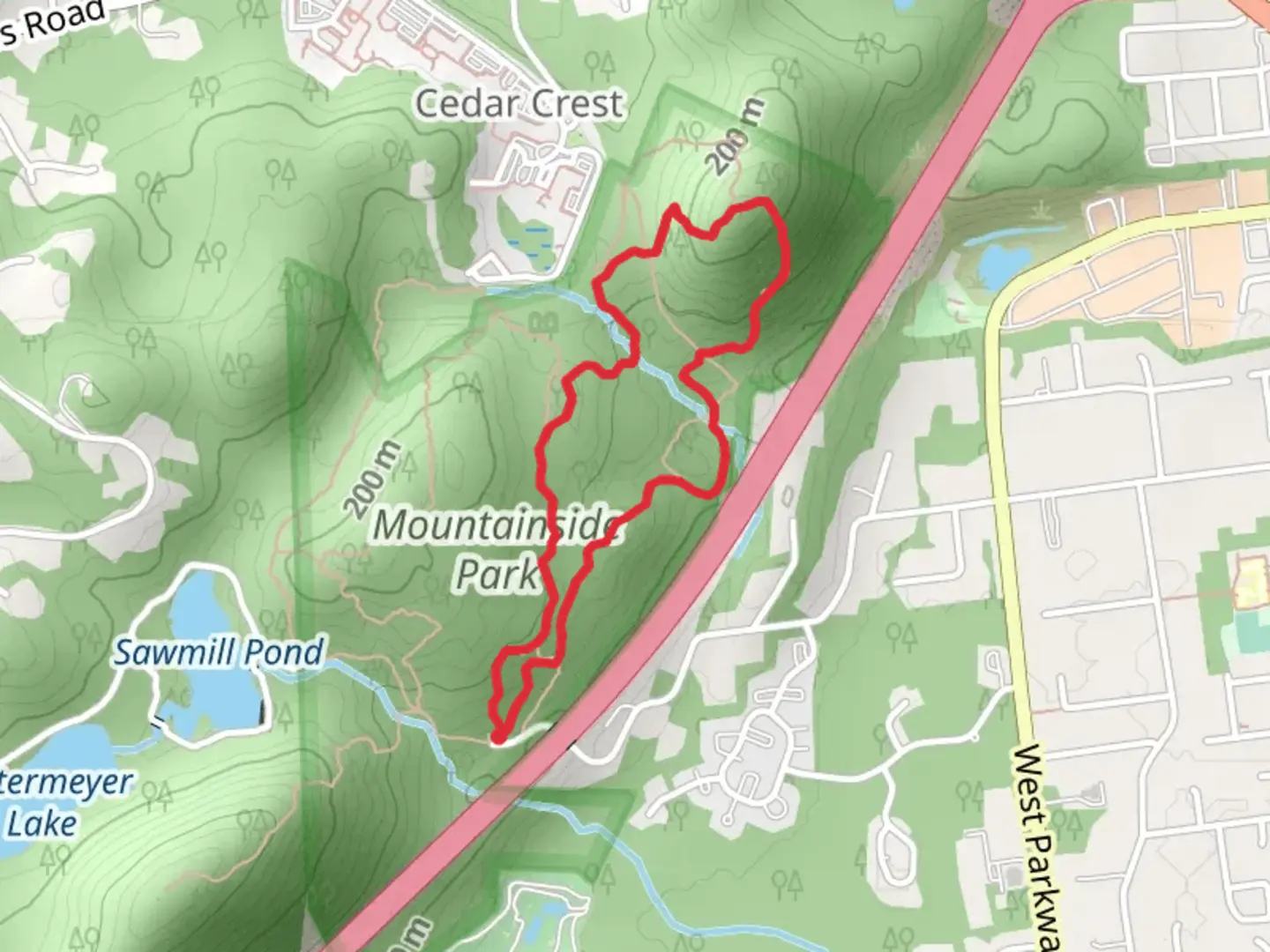 An image depicting the trail Blue and Yellow Loop Trail - Mountainside Park and its surrounding area.