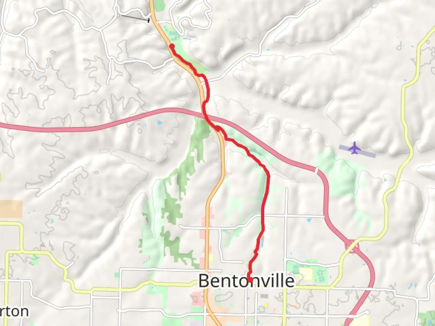 An image depicting the trail Bella Vista Lake via Razorback Regional Greenway and its surrounding area.