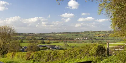 An image depicting the trail Cotswold Village Trail and its surrounding area.