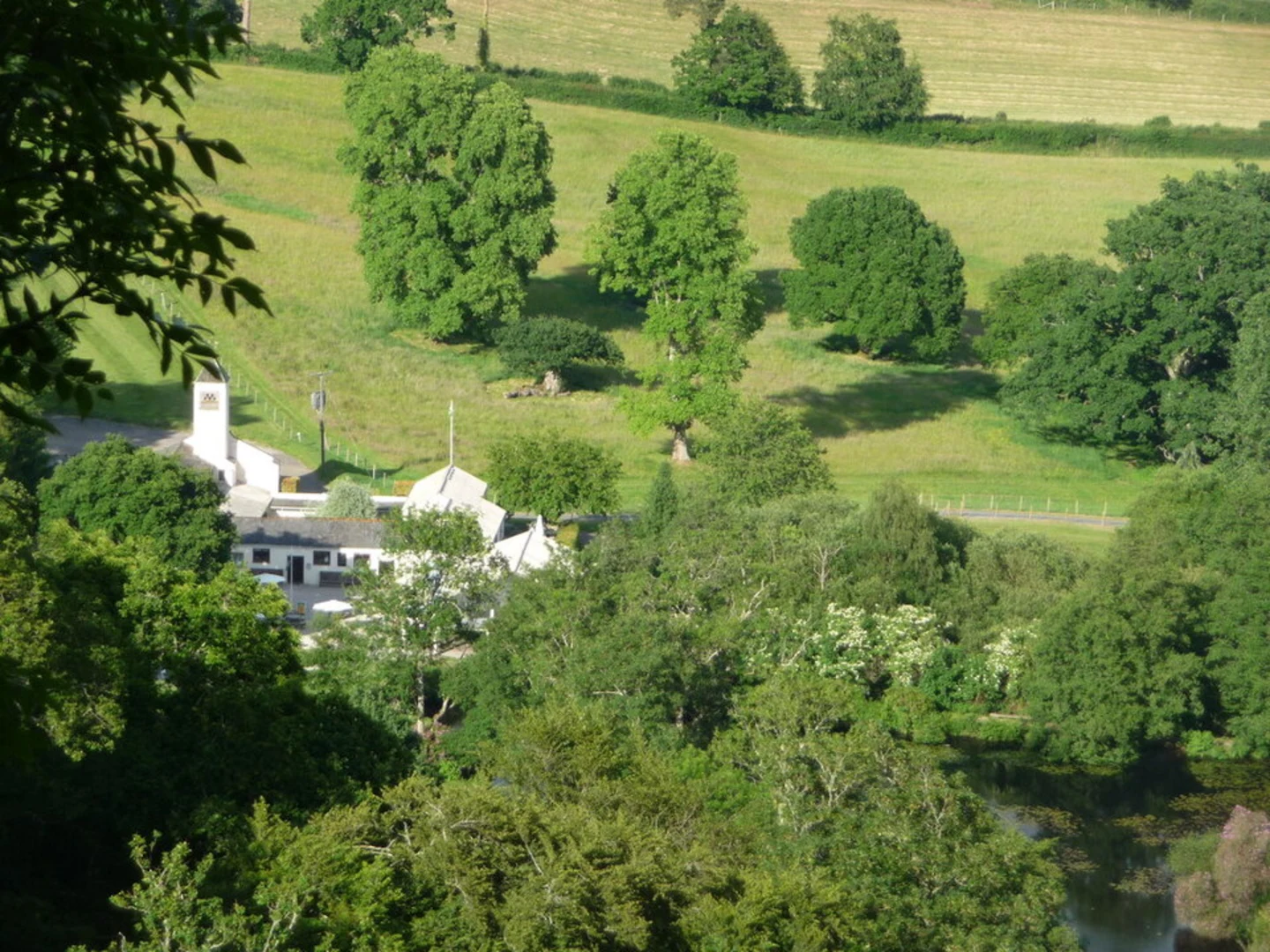 An image depicting the trail Canonteign Falls Walk and its surrounding area.