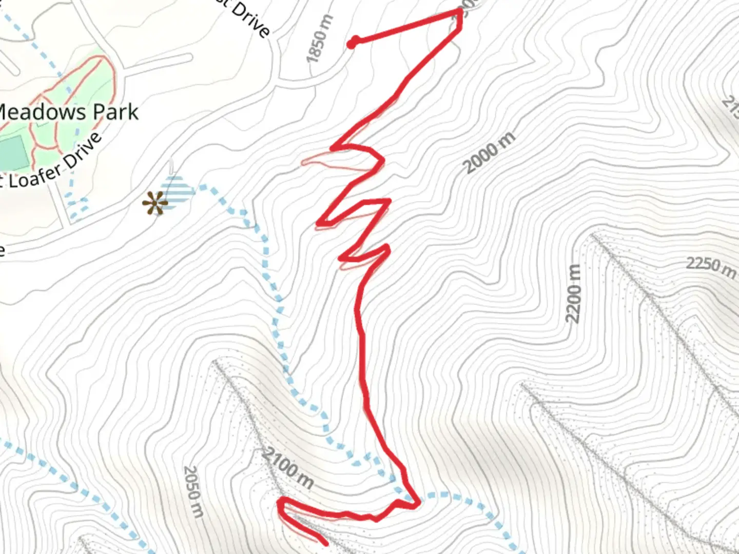 An image depicting the trail Woodland Hills Switchback Trail and its surrounding area.