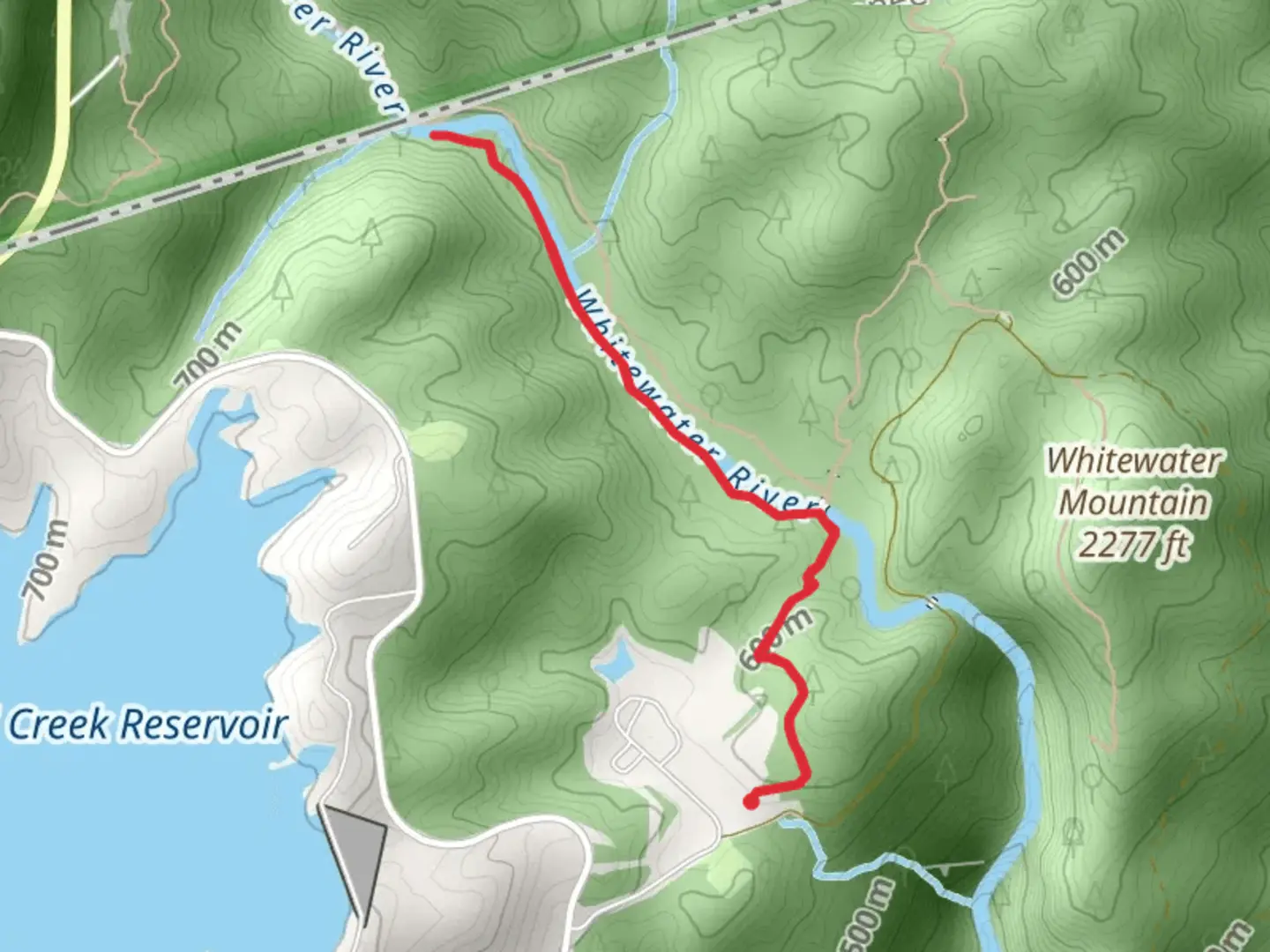 An image depicting the trail Lower Whitewater Falls Trail and Coon Branch and its surrounding area.