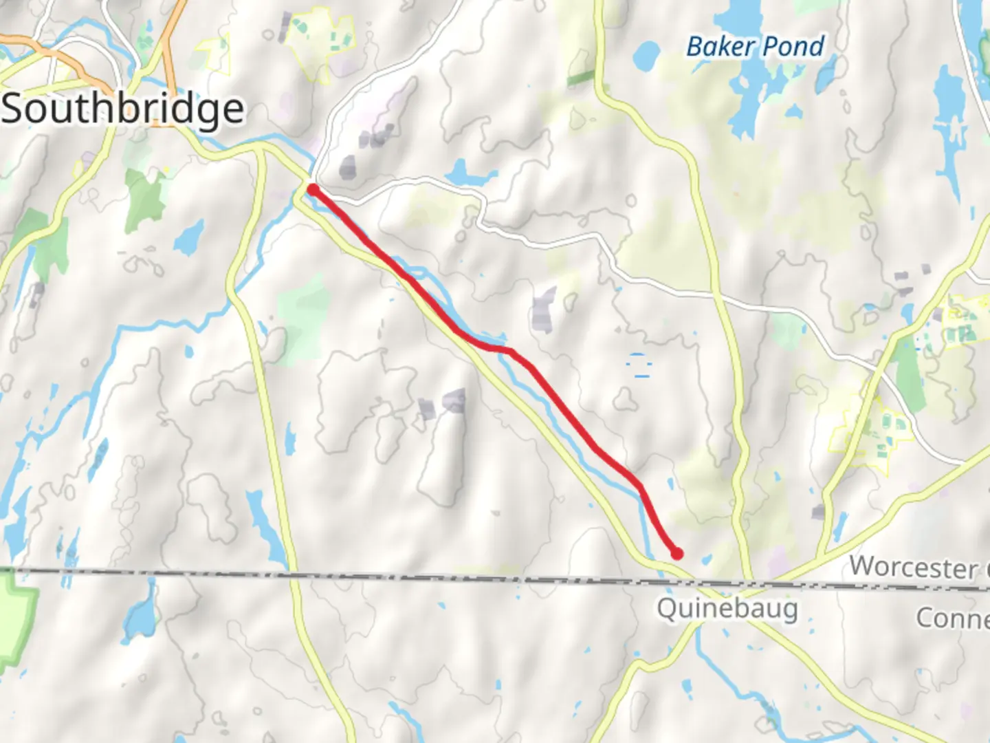 An image depicting the trail Quinebaug River Reservoir and its surrounding area.