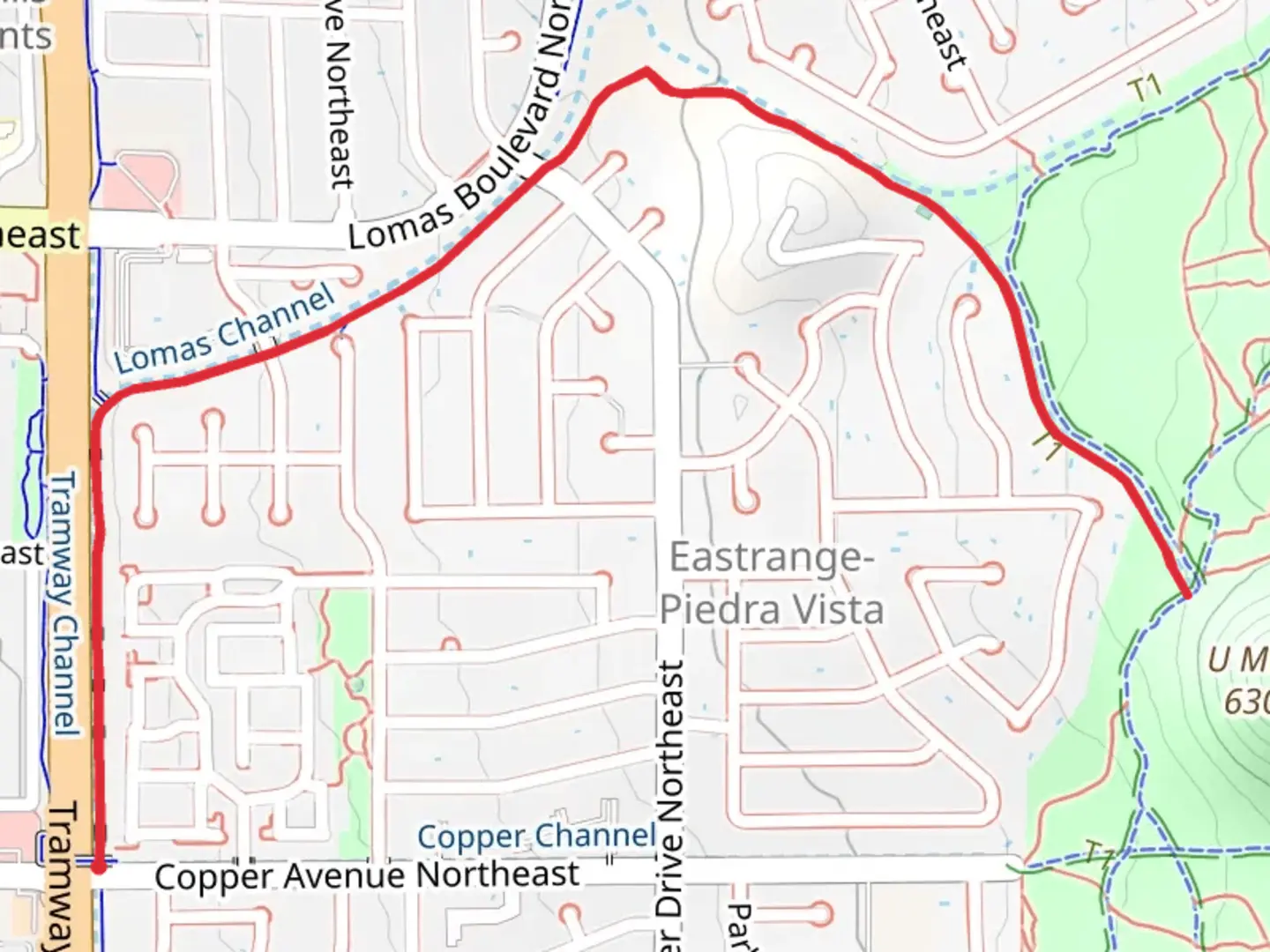 An image depicting the trail Tramway Trail and South Lomas Channel and its surrounding area.