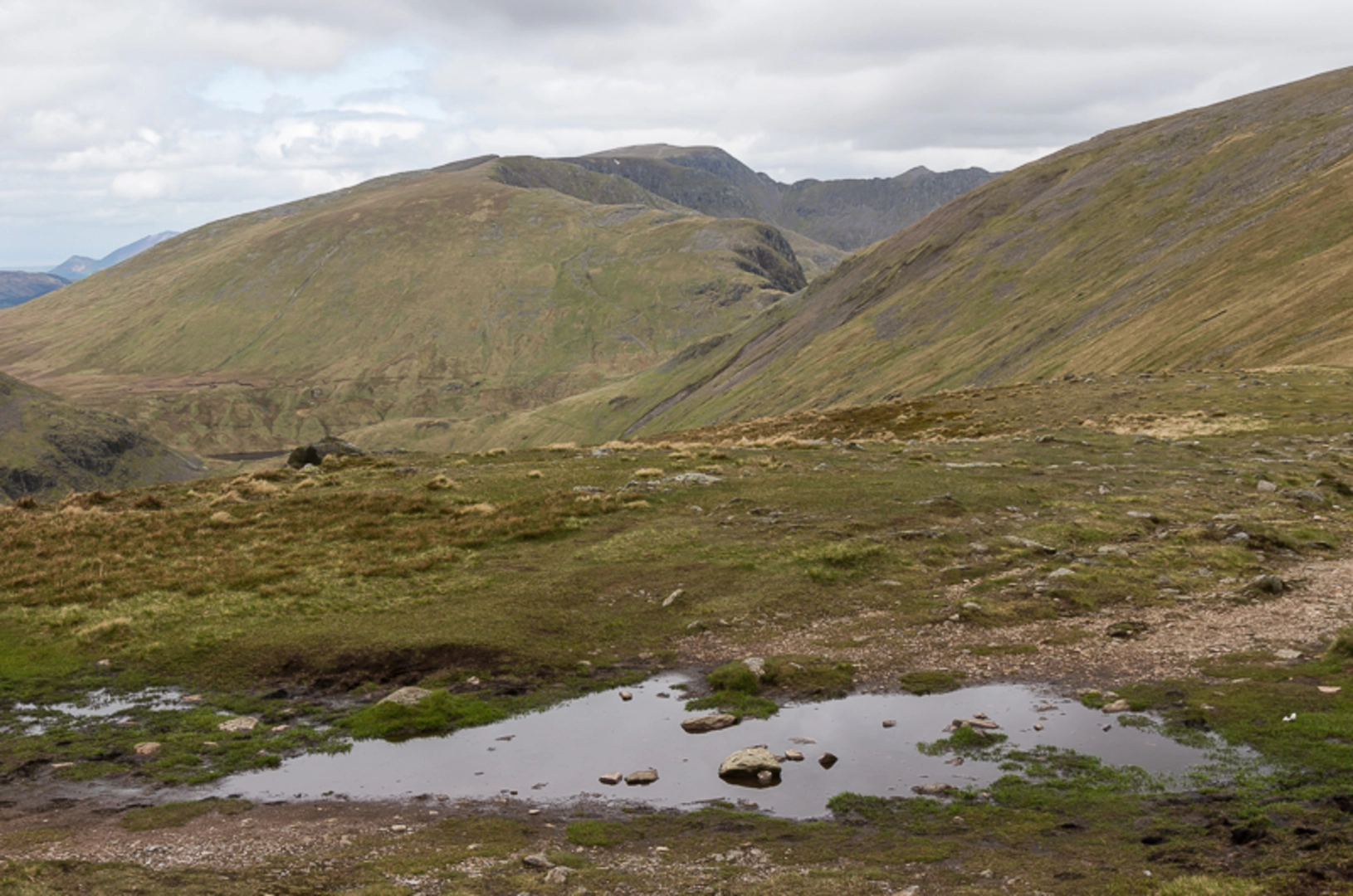 An image depicting the trail Little Cove, Nethermost Pike, Dollywaggon Pike and Grisedale Tarn Loop and its surrounding area.