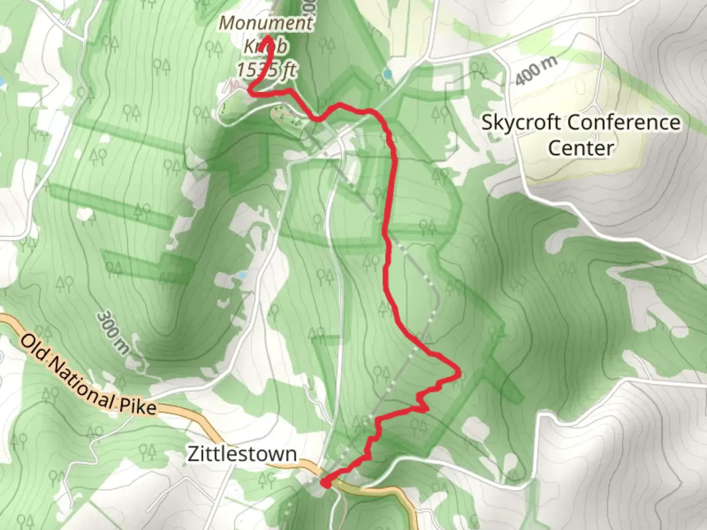 An image depicting the trail Monument Knob from Old National Pike and its surrounding area.