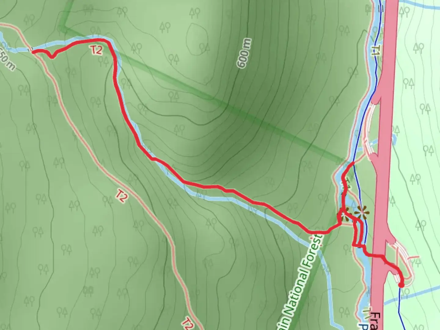 An image depicting the trail Pemigewasset River and Basin Cascades Trail and its surrounding area.