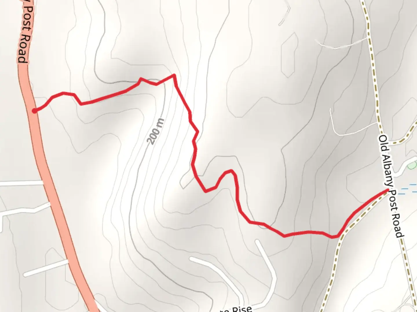 An image depicting the trail Philipse Brook from Albany Post Road and its surrounding area.