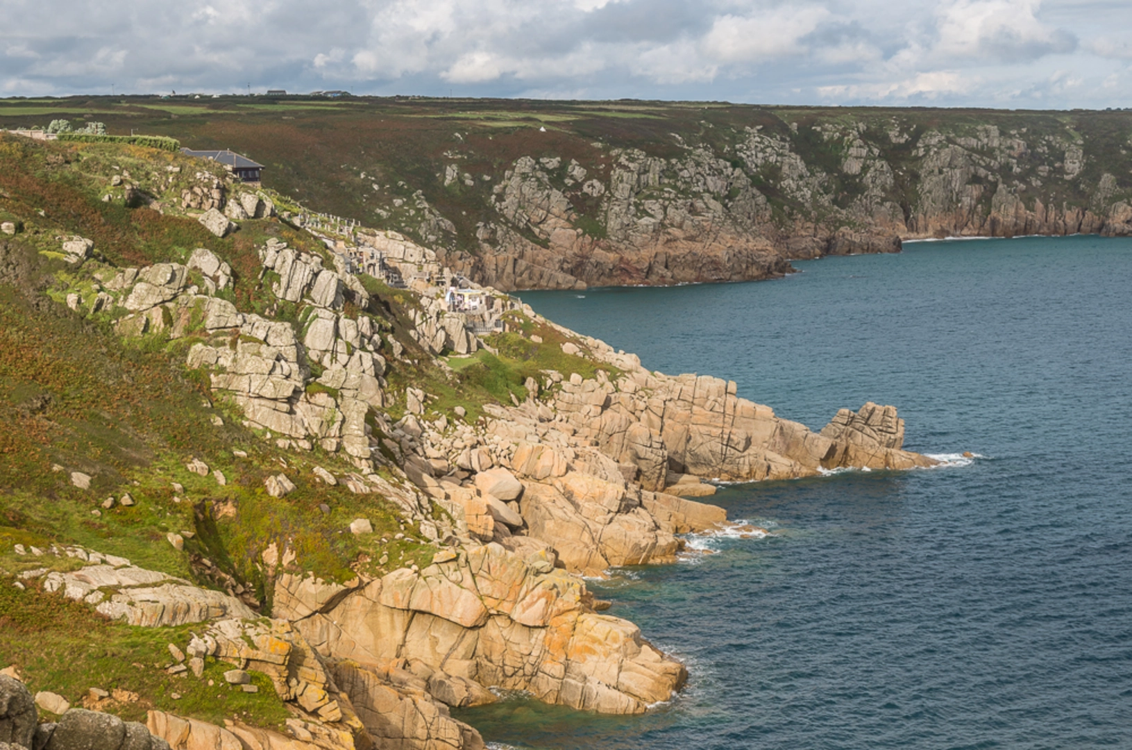 An image depicting the trail Porthcurno to Lands End Walk and its surrounding area.