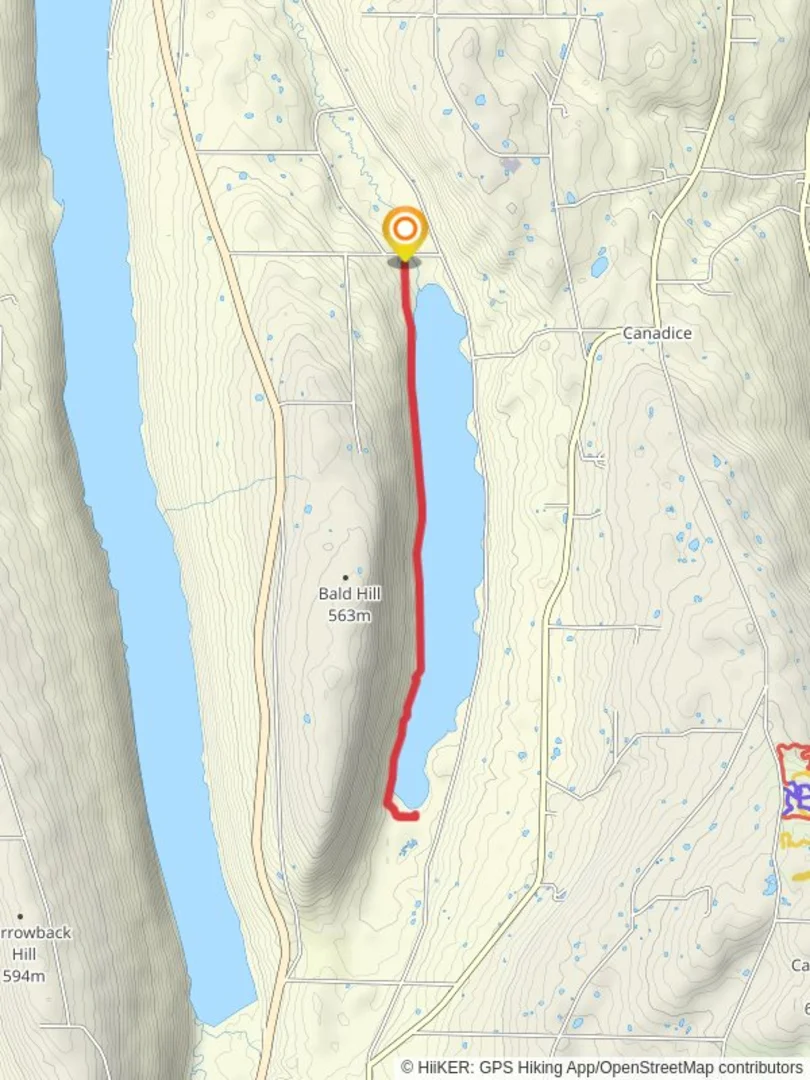 An image depicting the trail Canadice Lake and its surrounding area.