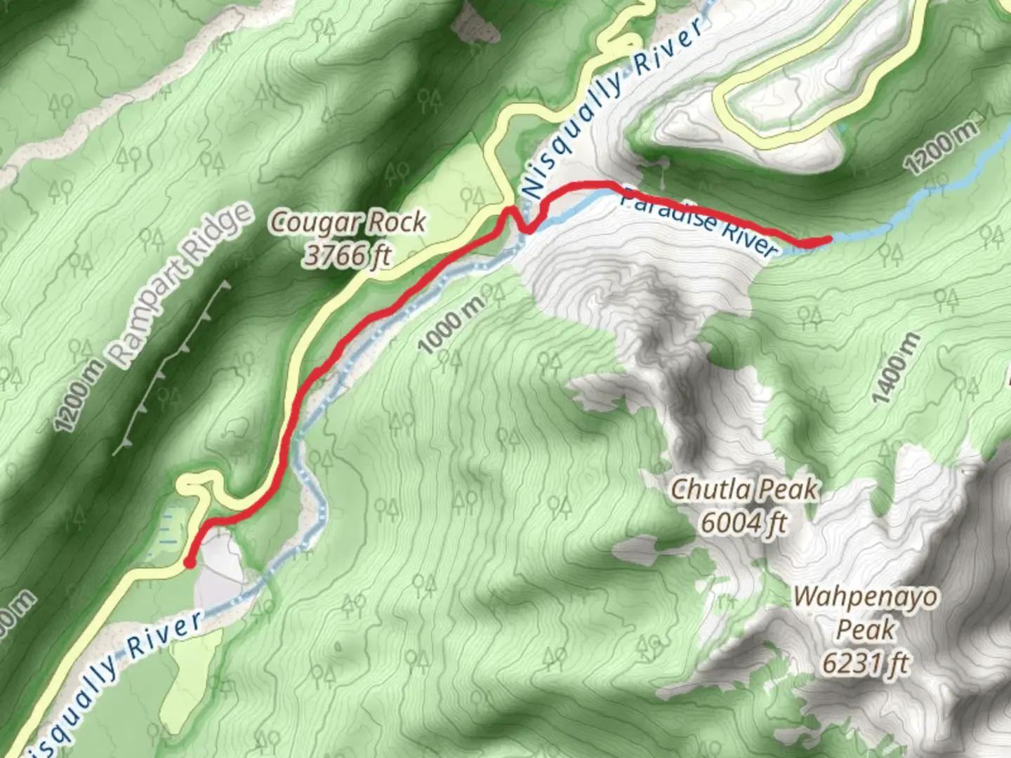 An image depicting the trail Carter Falls via Wonderland Trail and its surrounding area.