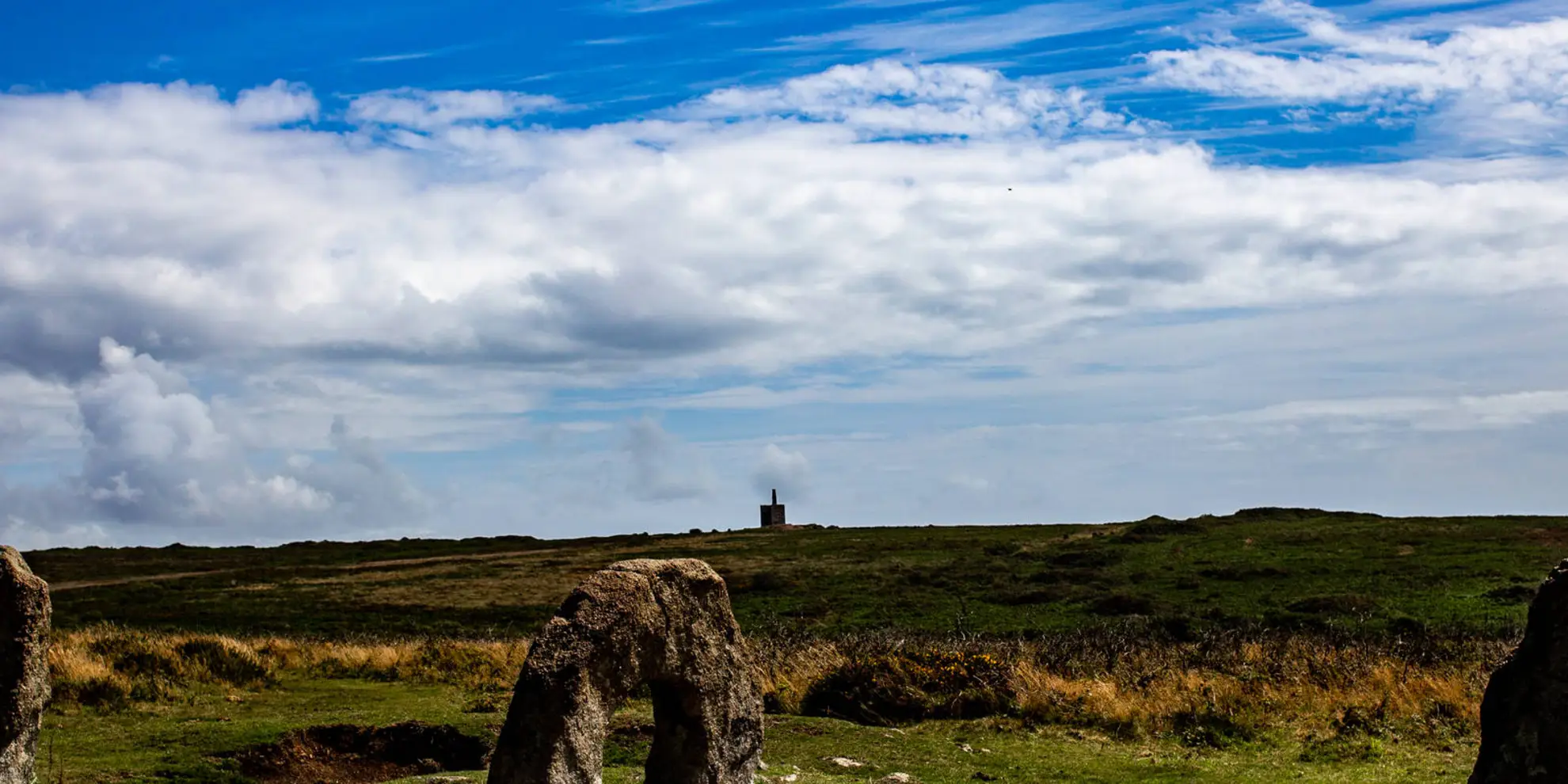 An image depicting the trail Men-an-tol and Ding Dong Mine from Bosullow and its surrounding area.