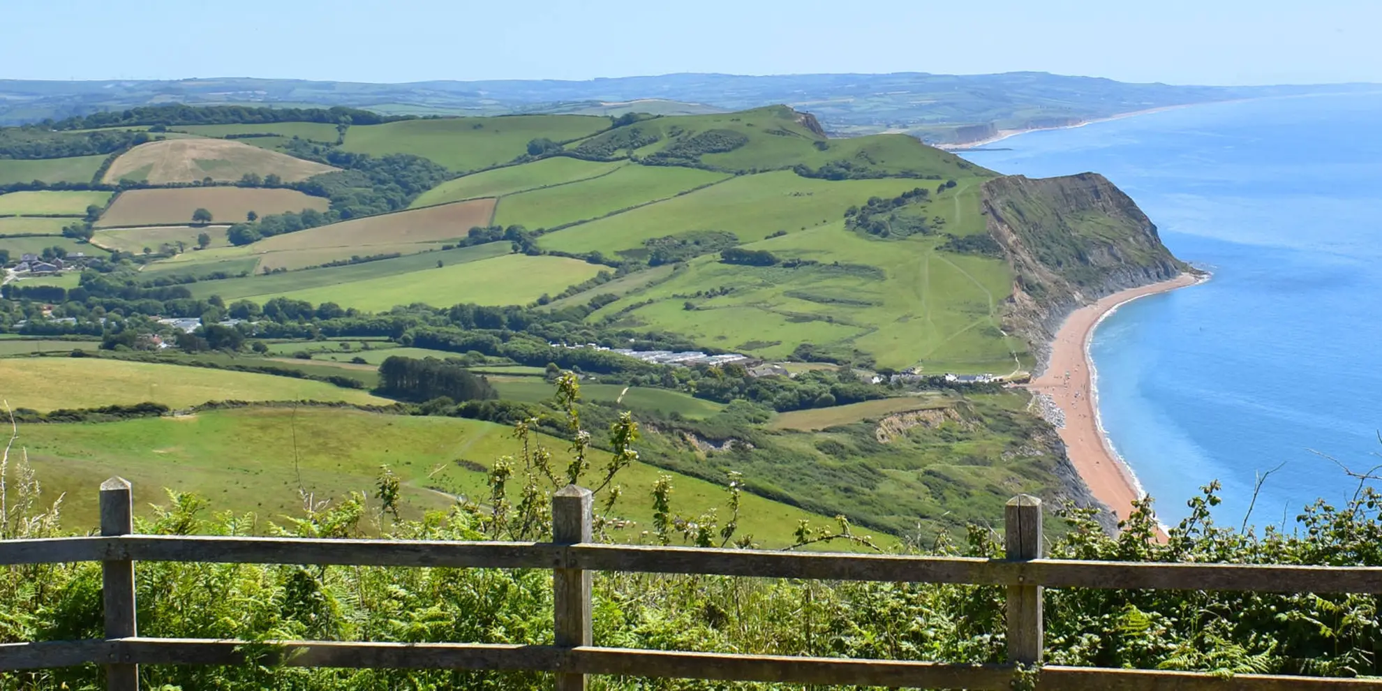 An image depicting the trail Golden Cap from Seatown and its surrounding area.