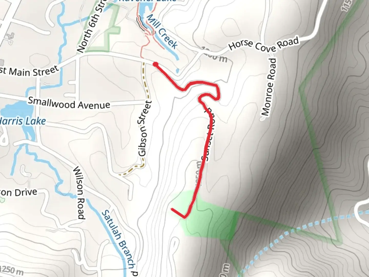 An image depicting the trail Ravenel Park via Sunset Road and its surrounding area.