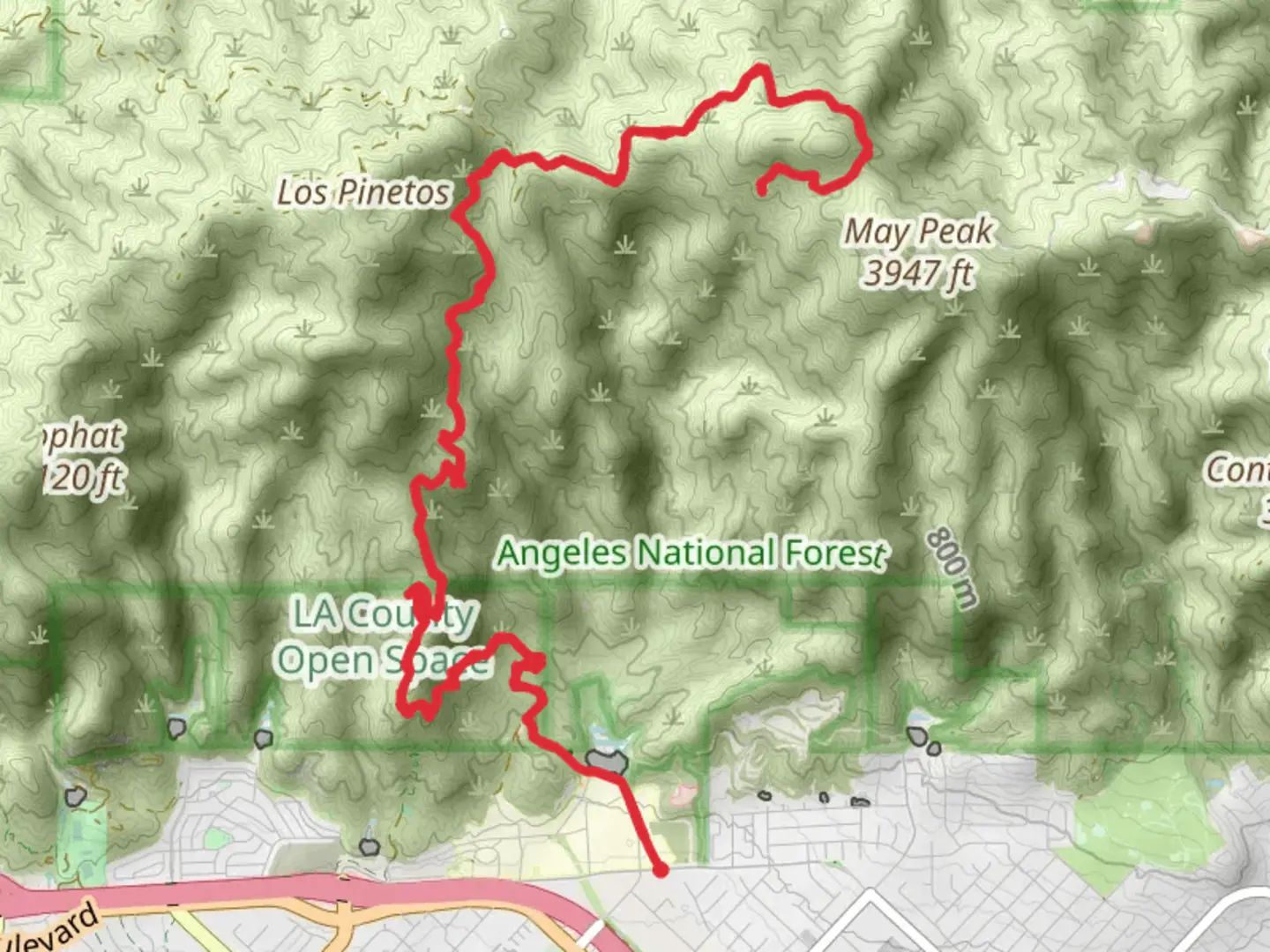 An image depicting the trail May Canyon Saddle via Los Pinetos Trail and its surrounding area.