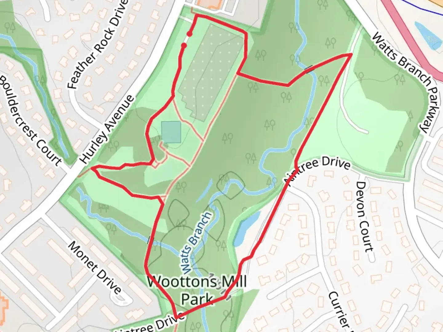 An image depicting the trail Woottons Mill Park Loop and its surrounding area.