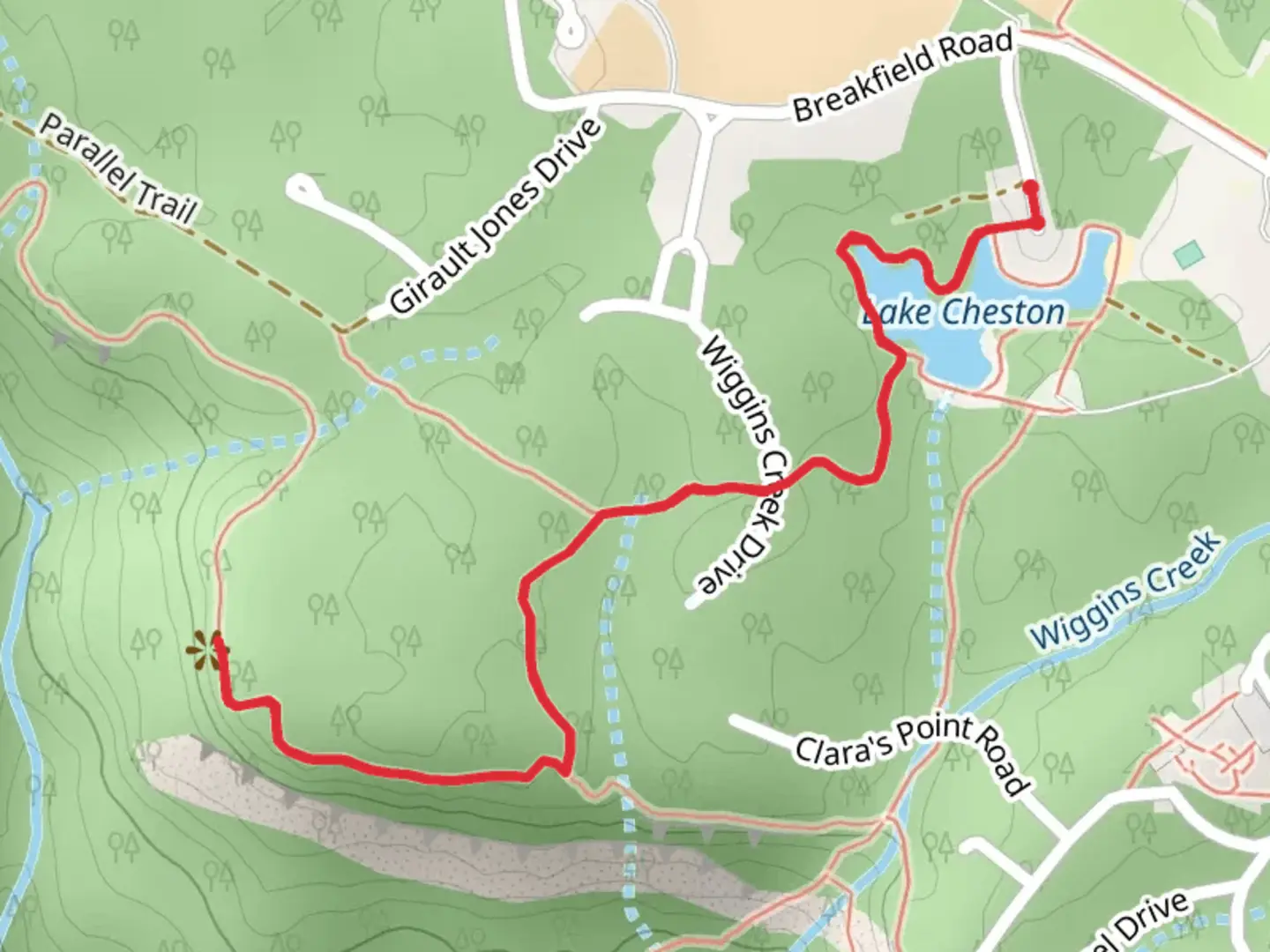An image depicting the trail Wiggins Creek Trail and its surrounding area.